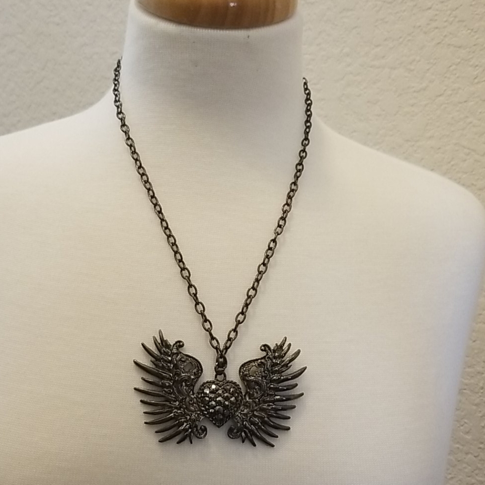 Winged heart necklace